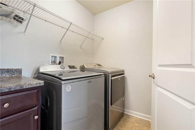 laundry room with washer and clothes dryer