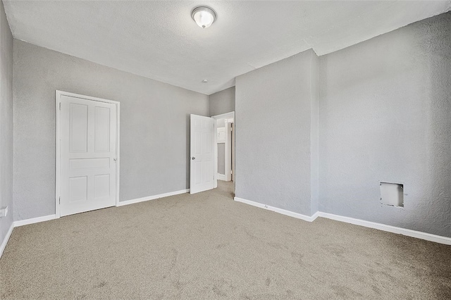 unfurnished bedroom with carpet flooring