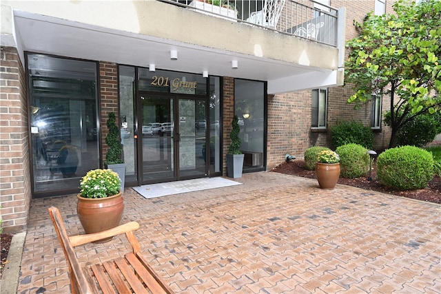 doorway to property featuring a balcony