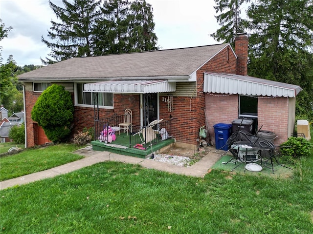 exterior space with a front lawn