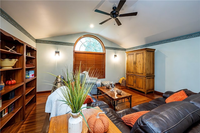 living room with lofted ceiling, dark hardwood / wood-style flooring, and ceiling fan