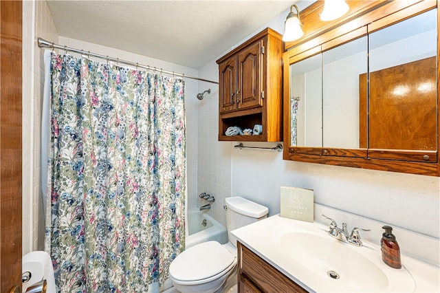 full bathroom featuring a textured ceiling, vanity, toilet, and shower / bath combination with curtain