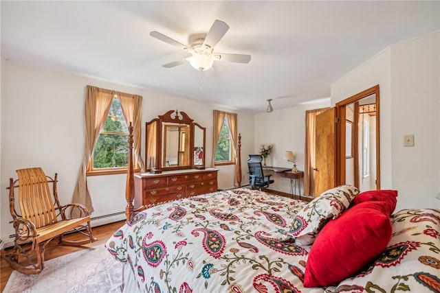 bedroom with wood-type flooring and ceiling fan