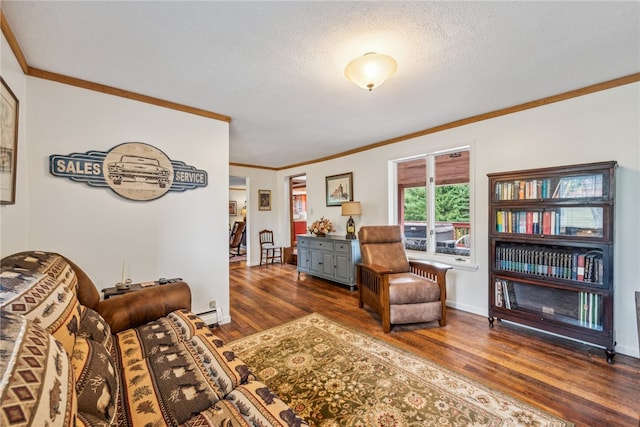 living room with a textured ceiling, dark hardwood / wood-style floors, a baseboard radiator, and crown molding