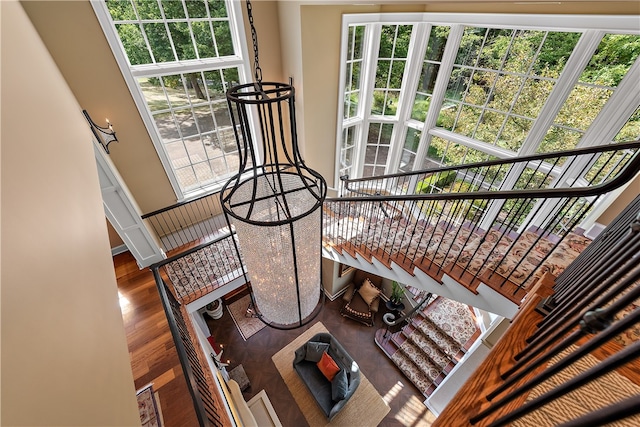 interior space with a healthy amount of sunlight and hardwood / wood-style floors