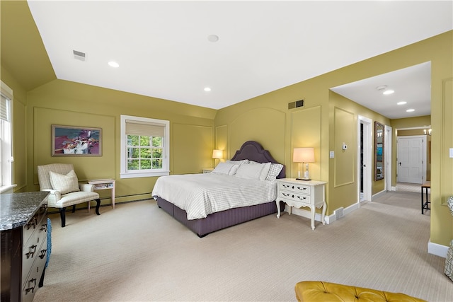 bedroom with light colored carpet