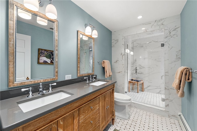 bathroom featuring baseboard heating, a shower with door, vanity, and toilet