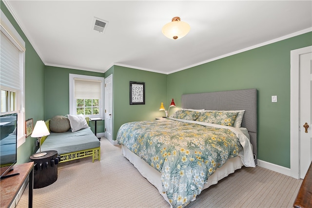 carpeted bedroom featuring ornamental molding