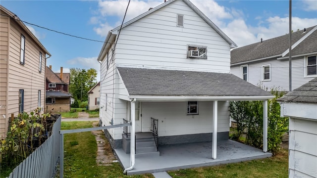 rear view of house with a patio