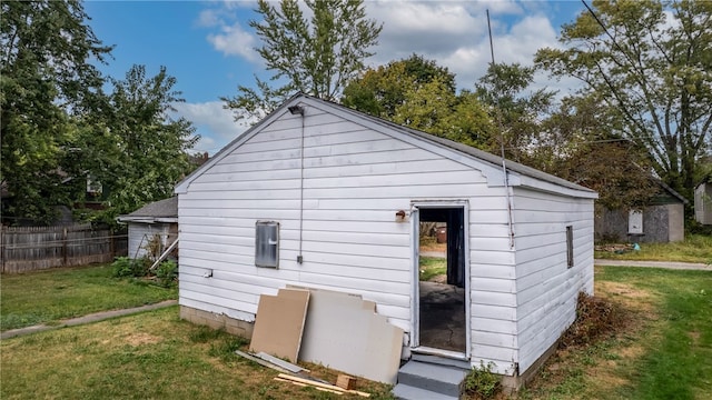 view of outdoor structure with a yard