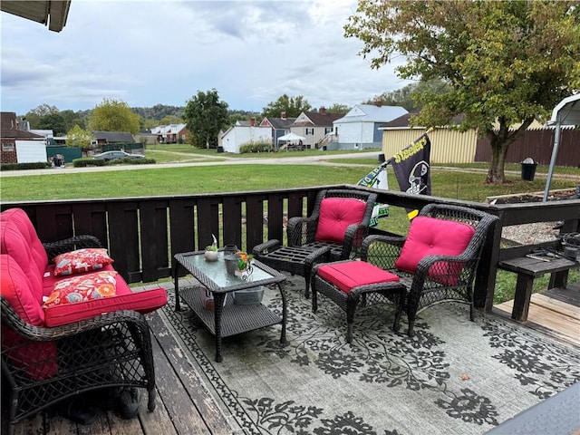 wooden deck featuring outdoor lounge area