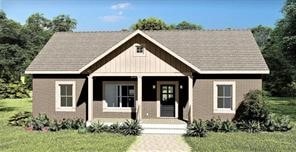 view of front facade featuring a front yard and a porch