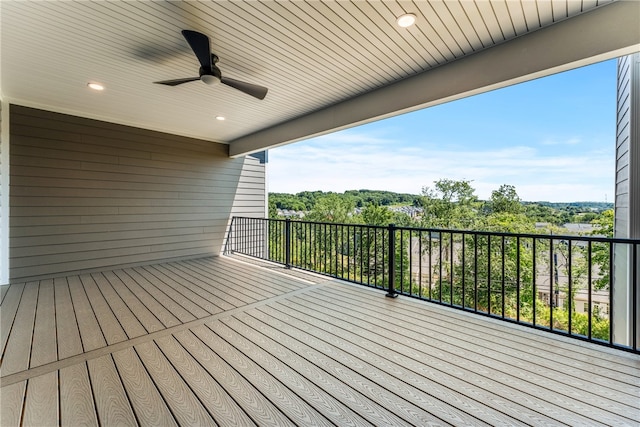 wooden terrace featuring ceiling fan