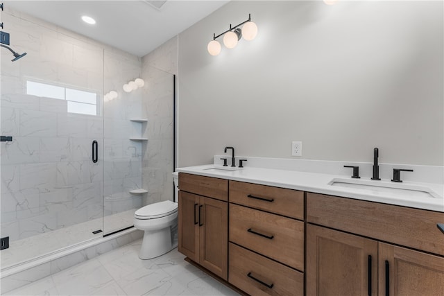 bathroom featuring vanity, toilet, and an enclosed shower