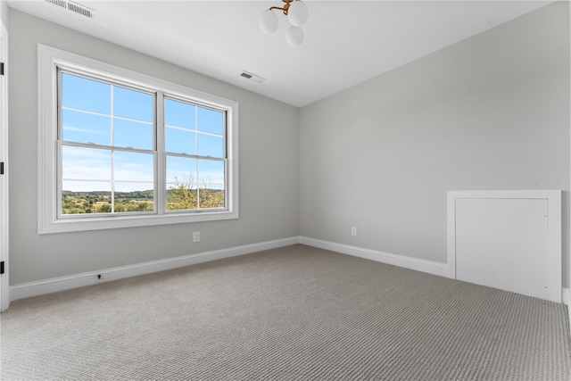 unfurnished room with carpet floors