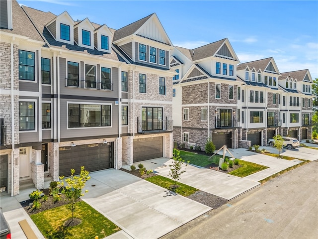 townhome / multi-family property featuring a garage