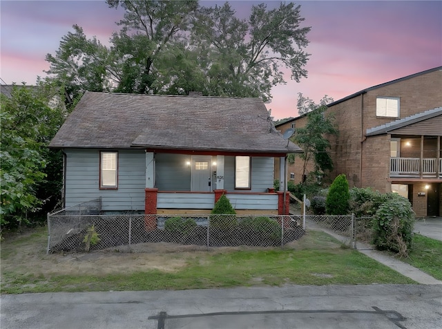 view of front of property featuring covered porch