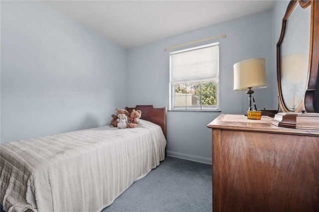 bedroom featuring light colored carpet