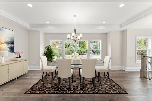 dining space with a chandelier, plenty of natural light, and hardwood / wood-style floors