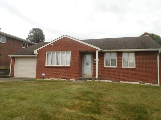 single story home with brick siding, an attached garage, a front yard, and driveway