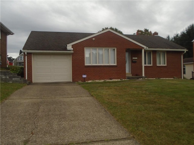 ranch-style house featuring an attached garage, brick siding, driveway, and a front yard