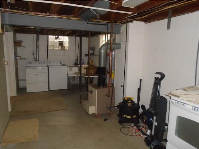 basement with sink and washing machine and clothes dryer