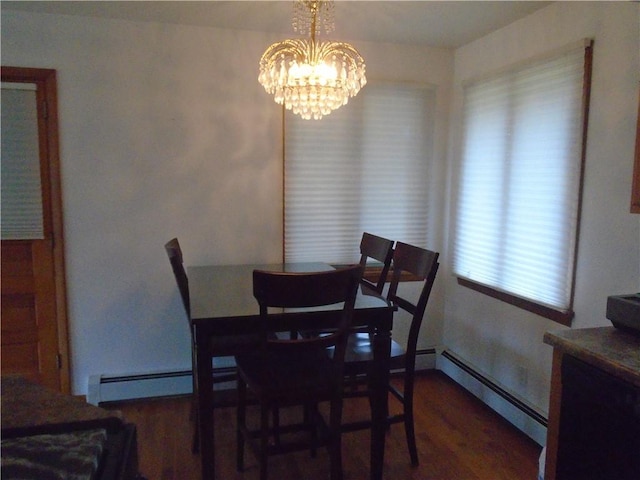 dining area with baseboard heating, wood finished floors, and an inviting chandelier