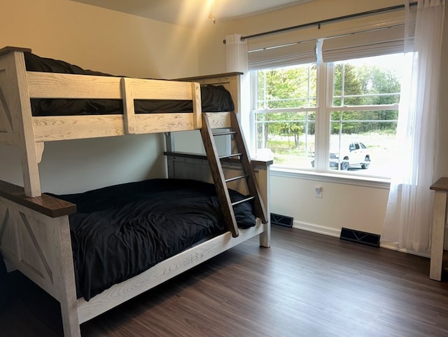 bedroom featuring dark hardwood / wood-style floors