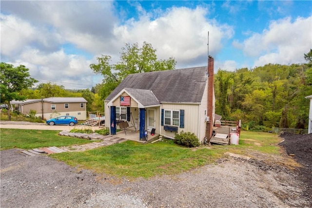265 Johnston Rd, Bentleyville, PA 15314 - bungalow-style home with a front lawn, a chimney, and roof with shingles