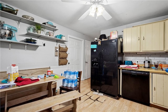 265 Johnston Rd, Bentleyville, PA 15314 - kitchen with black appliances, cream cabinets, light wood-style flooring, and open shelves