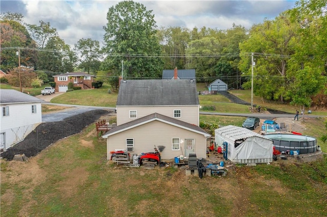 265 Johnston Rd, Bentleyville, PA 15314 - rear view of property with a yard