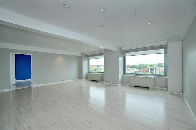 empty room featuring light hardwood / wood-style floors