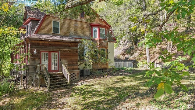 1487 Beaver Rd, Sewickley, PA 15143 - view of front of home featuring french doors, a front lawn, cooling unit, fence, and a gambrel roof