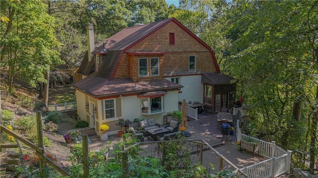 1487 Beaver Rd, Sewickley, PA 15143 - rear view of property with fence, a gambrel roof, and stucco siding