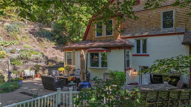 1487 Beaver Rd, Sewickley, PA 15143 - exterior space featuring a patio area, an outdoor hangout area, and brick siding