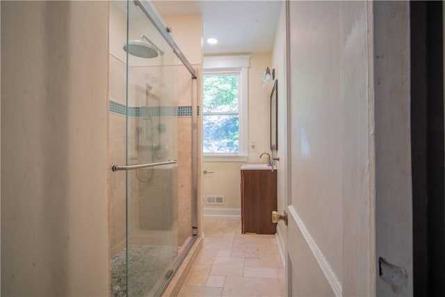 1487 Beaver Rd, Sewickley, PA 15143 - bathroom featuring stone tile flooring, visible vents, vanity, and a stall shower