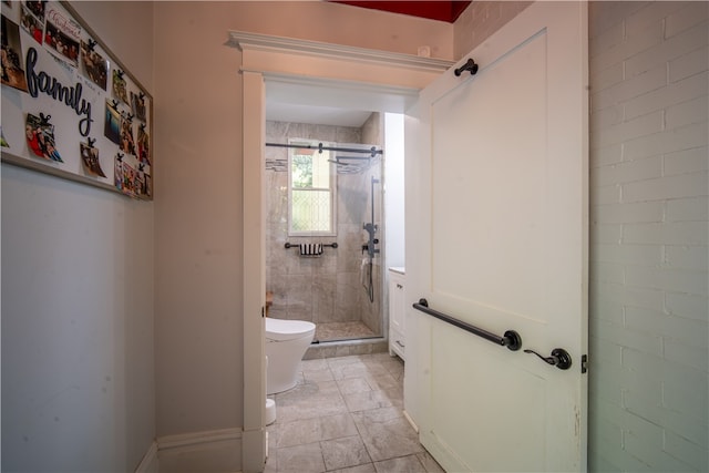 bathroom with tiled shower and toilet