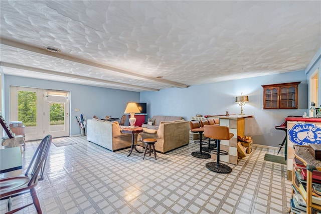 living room featuring a textured ceiling