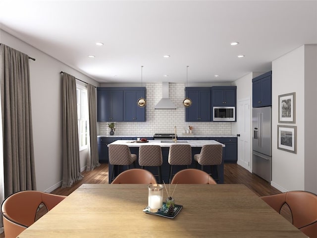 dining space with dark hardwood / wood-style flooring and sink