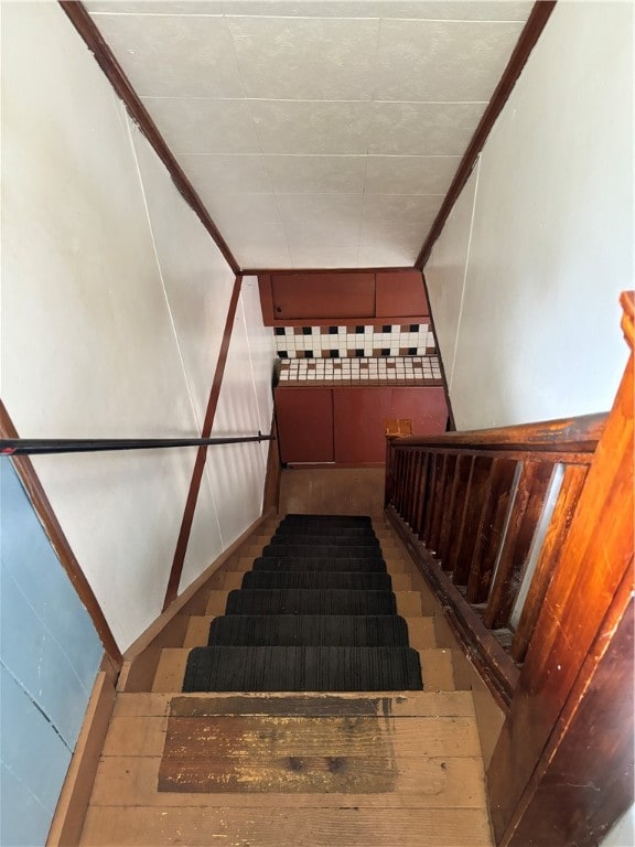 stairway with crown molding