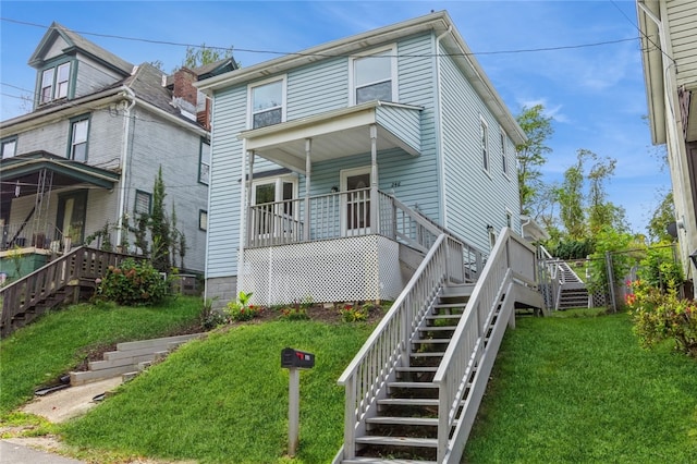 view of front of home with a front yard