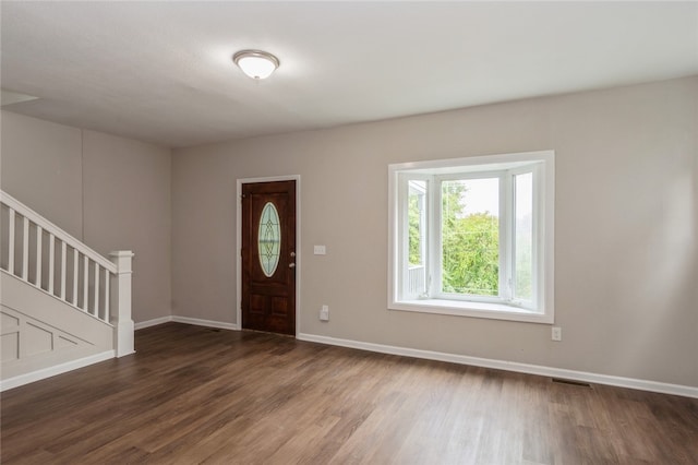 entrance foyer with dark wood-type flooring