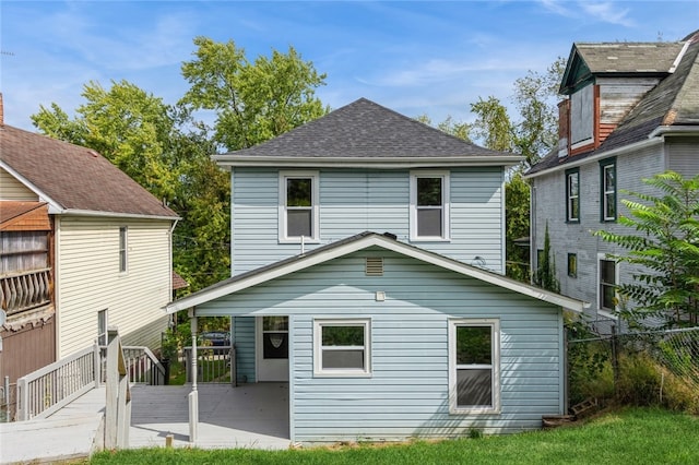 rear view of house with a patio