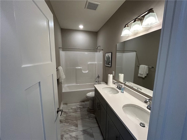 full bathroom featuring vanity, toilet, and shower / washtub combination