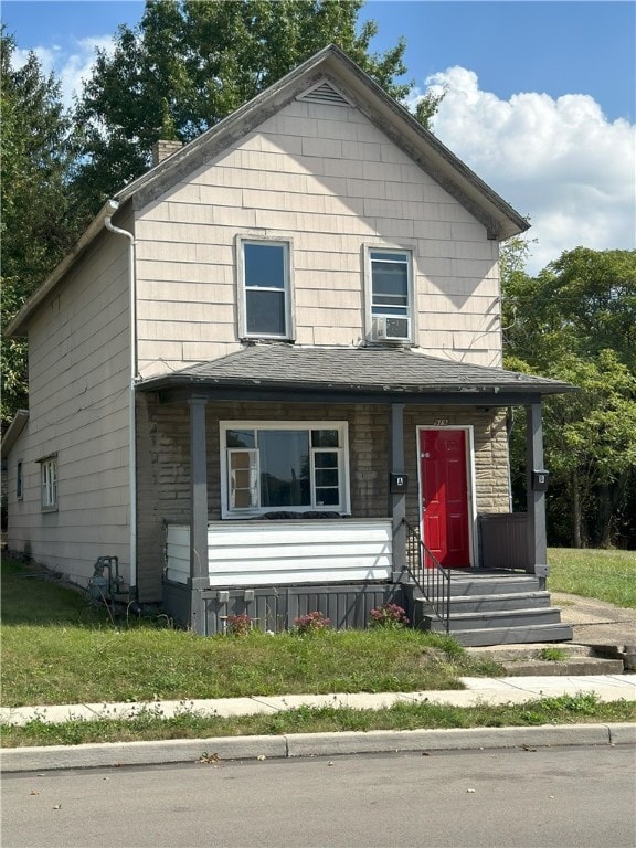 front facade featuring cooling unit