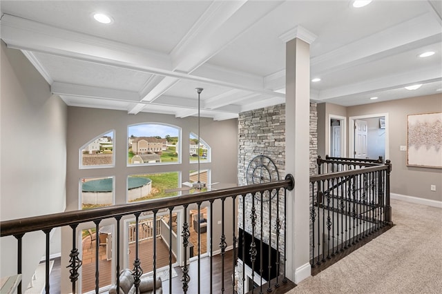 hall featuring coffered ceiling, dark wood-type flooring, crown molding, and beam ceiling