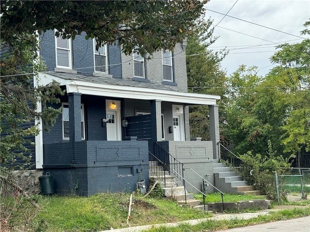 view of front facade with covered porch