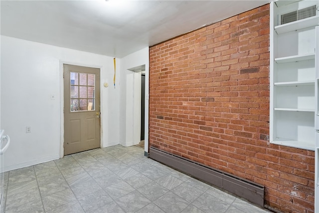 interior space with built in shelves and brick wall