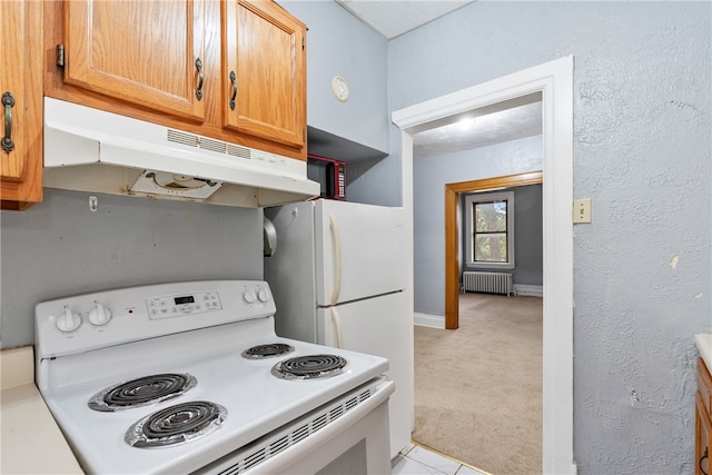 kitchen featuring radiator, electric range, and light colored carpet