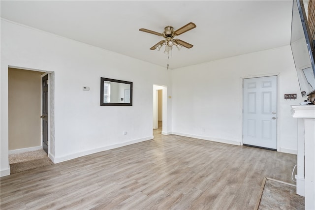 unfurnished living room with light wood-type flooring and ceiling fan